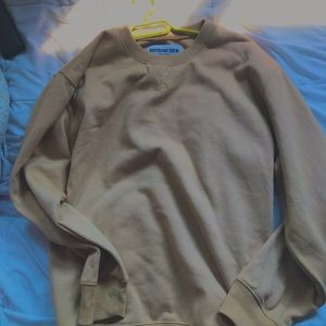 large beige sweatshirt